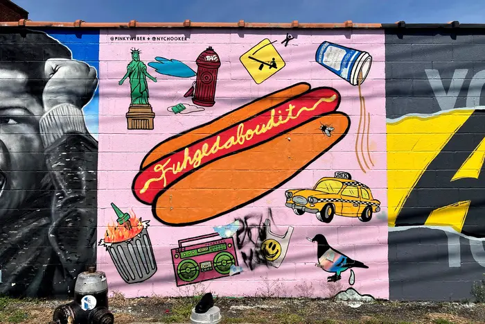 a mural with a hot dog on it